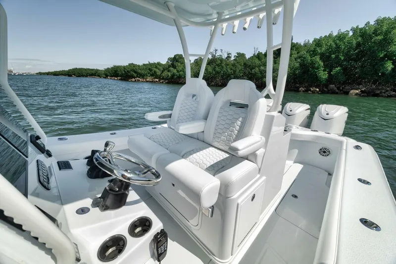 36 Offshore Yacht Photos Pics 2025 Yellowfin 36 Offshore boat interior with luxurious seating and modern controls.