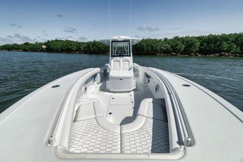 36 Offshore Yacht Photos Pics 2025 Yellowfin 36 Offshore boat on water, featuring spacious deck and modern design.