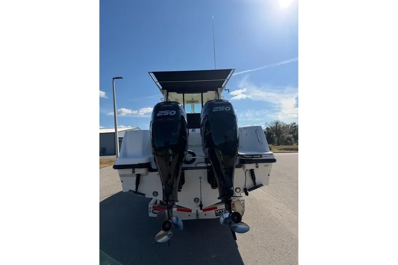  Yacht Photos Pics 2017 Boston Whaler 285 Conquest with dual 250 horsepower engines, rear view.
