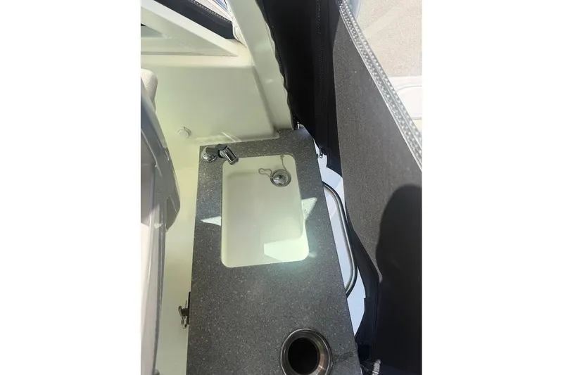  Yacht Photos Pics 2017 Boston Whaler 285 Conquest boat interior sink and countertop detail.