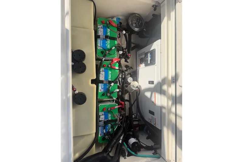  Yacht Photos Pics 2017 Boston Whaler 285 Conquest battery compartment with multiple batteries and wiring.