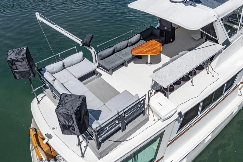 Maverick Yacht Photos Pics Aerial view of 1979 Hatteras 58 Motor Yacht with spacious deck and seating area.