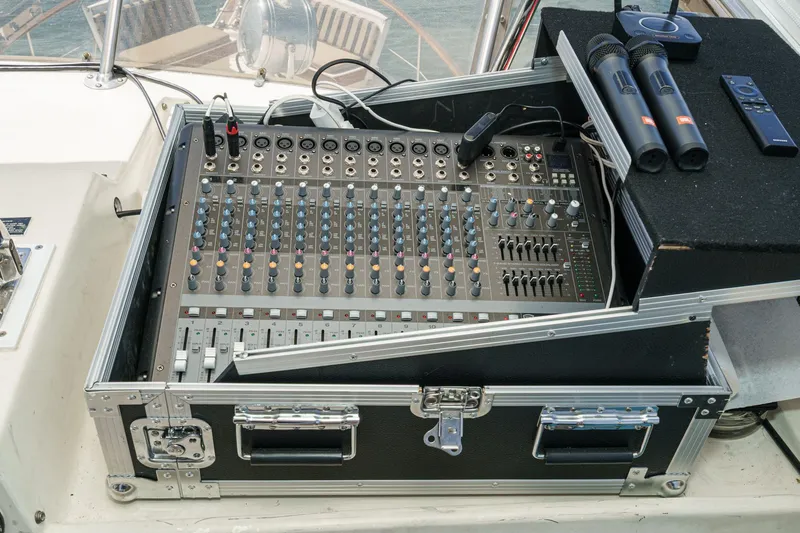 Maverick Yacht Photos Pics Audio mixer setup on 1979 Hatteras 58 Motor Yacht with microphones and remote control.