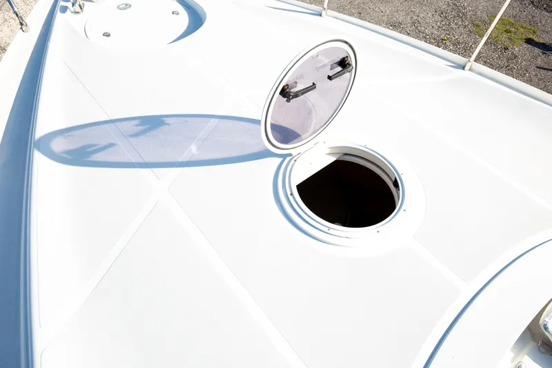  Yacht Photos Pics Open hatch on 2002 Pershing 52 yacht deck, showing interior access.