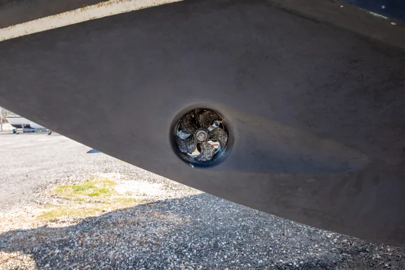  Yacht Photos Pics Close-up of a 2002 Pershing 52 boat propeller on dry land.