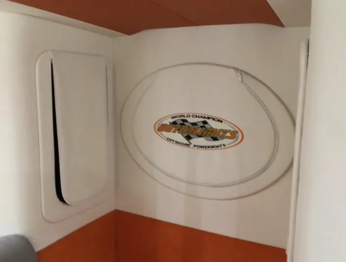  Yacht Photos Pics 2015 Outerlimits SL-50 interior with logo, white and orange design.