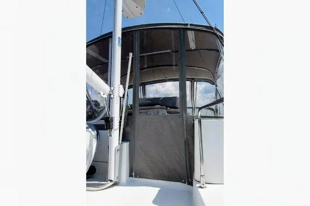 Aquavit Yacht Photos Pics 2006 Beneteau Swift Trawler 42, rear view, showcasing covered deck and canopy.