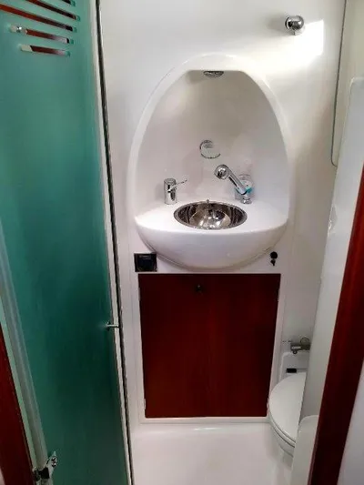 Aquavit Yacht Photos Pics 2006 Beneteau Swift Trawler 42 bathroom with sink, toilet, and modern fixtures.