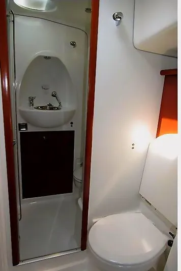 Aquavit Yacht Photos Pics 2006 Beneteau Swift Trawler 42 bathroom with compact sink and toilet.