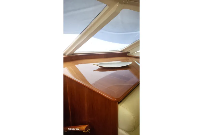 Last Dance Yacht Photos Pics Interior of 2006 Riviera 47 Open Flybridge Series II with polished wood finish.