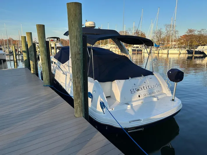  Yacht Photos Pics 2005 Sea Ray 340 Sundancer docked at a marina.