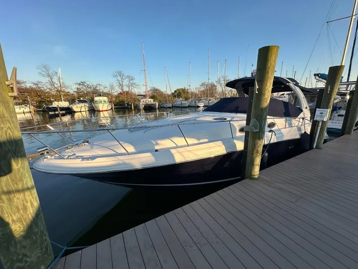  Yacht Photos Pics 2005 Sea Ray 340 Sundancer yacht docked at marina.