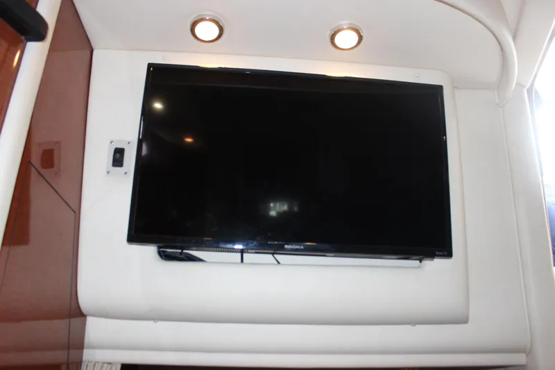  Yacht Photos Pics Flat-screen TV in the cabin of a 2005 Sea Ray 340 Sundancer yacht.
