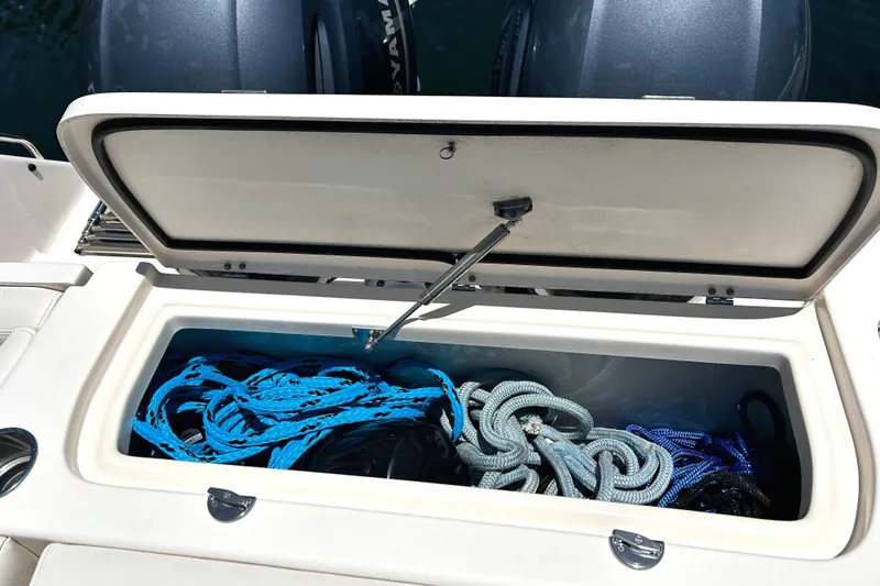  Yacht Photos Pics Storage compartment on 2020 Grady-White Freedom 275 boat with ropes inside.