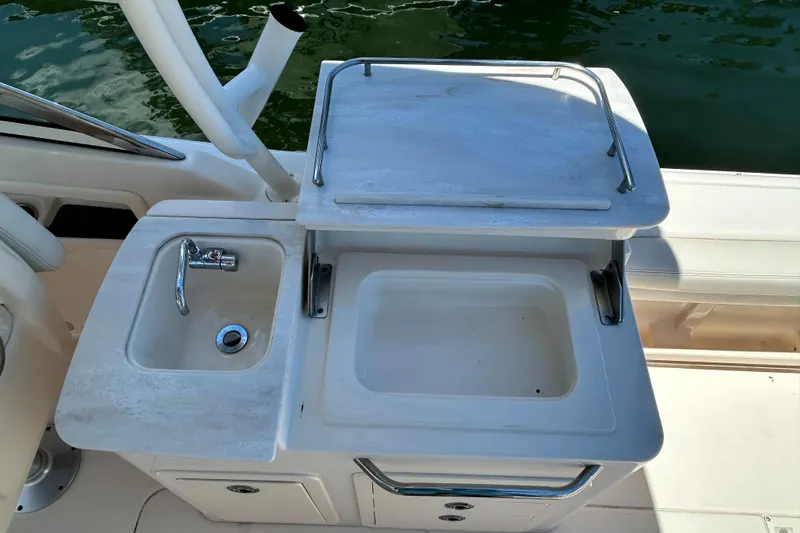  Yacht Photos Pics 2020 Grady-White Freedom 275 boat sink and prep station with storage.