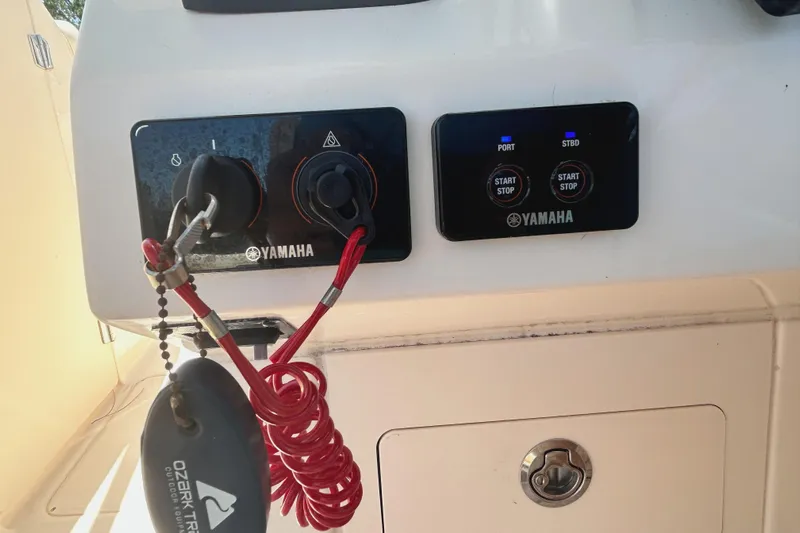  Yacht Photos Pics Yamaha controls on 2020 Grady-White Freedom 275 boat dashboard with safety lanyard.