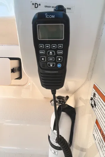  Yacht Photos Pics ICOM marine radio on 2020 Grady-White Freedom 275 boat dashboard.