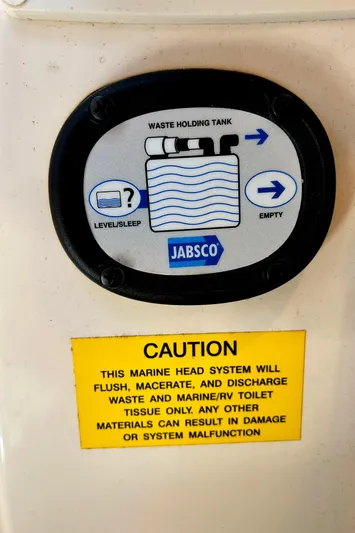  Yacht Photos Pics 2020 Grady-White Freedom 275 waste tank gauge with caution label for marine head system.