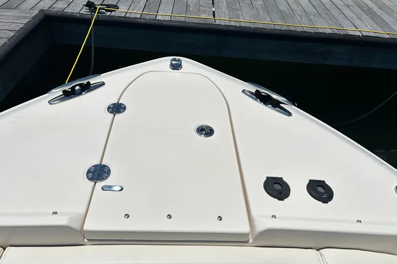  Yacht Photos Pics 2020 Grady-White Freedom 275 boat deck, docked, showcasing sleek design and hardware.