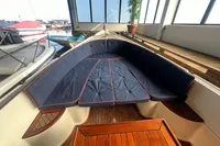 Interboat 21 Classic 2000 with 2018 motor, featuring spacious seating and elegant wooden deck.