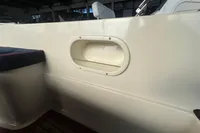 Interboat 21 Classic 2000 interior detail with new 2018 motor, showcasing seating and storage.