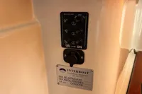 Control panel and label on Interboat 21 Classic, 2000 model, with 2018 motor upgrade.
