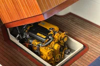 Interboat 21 Classic 2000 with 2018 engine, showcasing yellow motor on wooden deck.
