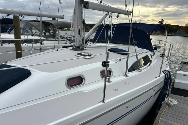  Yacht Photos Pics 2009 Catalina 375 sailboat docked, featuring sleek design and spacious deck.