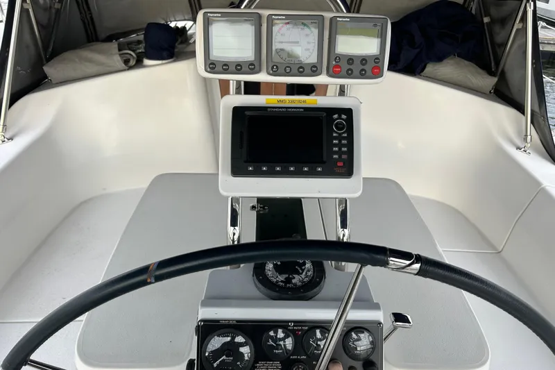  Yacht Photos Pics Cockpit of 2009 Catalina 375 sailboat with navigation instruments and steering wheel.