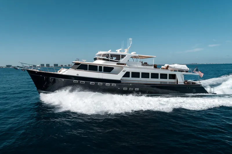 Rat Pack Yacht Photos Pics 2011 Marlow Explorer yacht cruising on open water under clear blue skies.