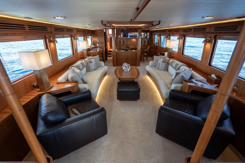 Rat Pack Yacht Photos Pics Luxurious interior of 2011 Marlow Explorer yacht with elegant seating and ocean views.