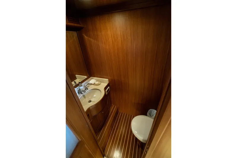 Rat Pack Yacht Photos Pics Luxurious wooden bathroom interior on 2011 Marlow Explorer yacht.