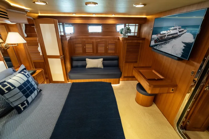 Rat Pack Yacht Photos Pics Luxurious 2011 Marlow Explorer yacht cabin with elegant wood interior and modern amenities.