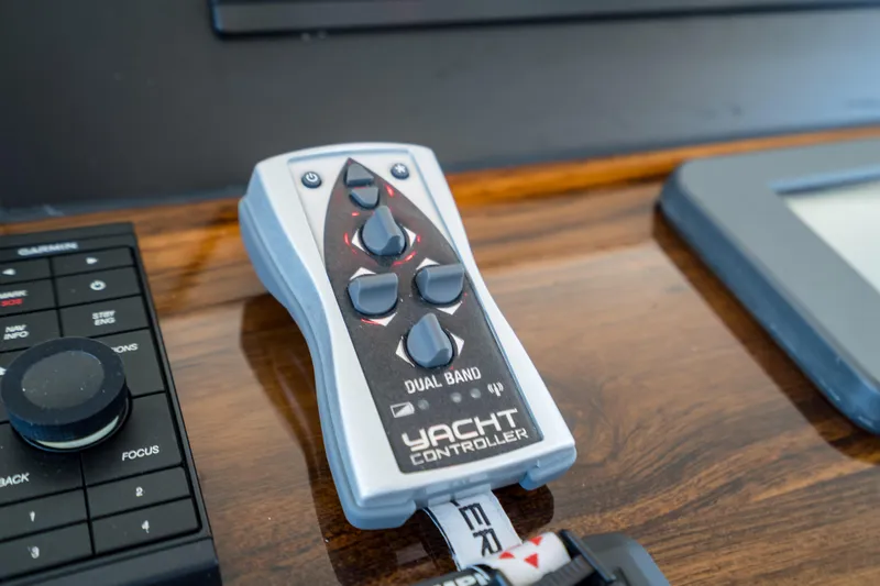 Rat Pack Yacht Photos Pics Remote control for 2011 Marlow Explorer yacht, featuring dual band technology.