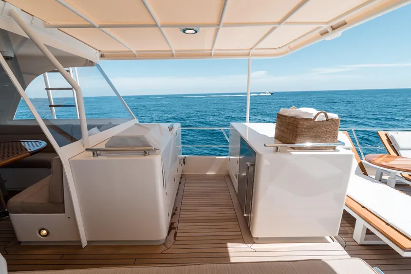 Rat Pack Yacht Photos Pics Luxurious 2011 Marlow Explorer yacht deck with ocean view and elegant seating area.