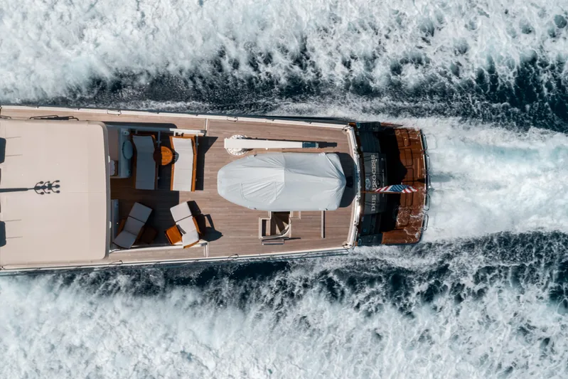 Rat Pack Yacht Photos Pics Aerial view of 2011 Marlow Explorer yacht cruising through ocean waves.