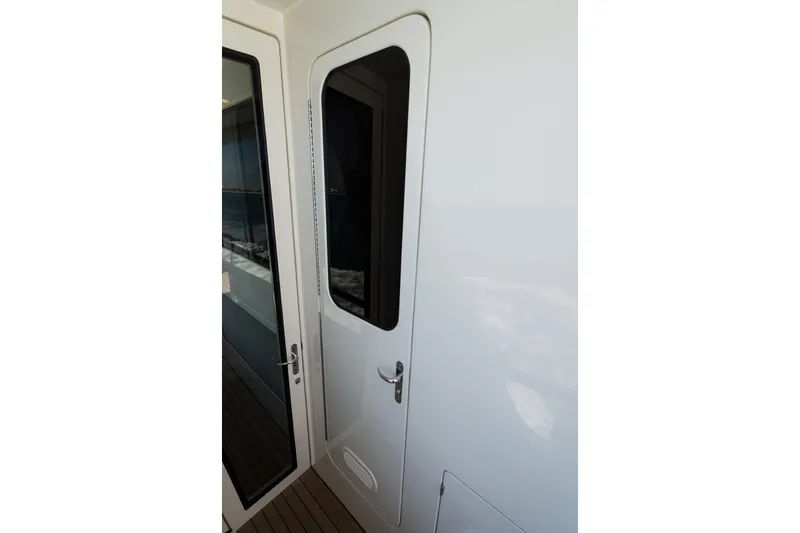 Rat Pack Yacht Photos Pics 2011 Marlow Explorer yacht door with sleek design and modern handle.