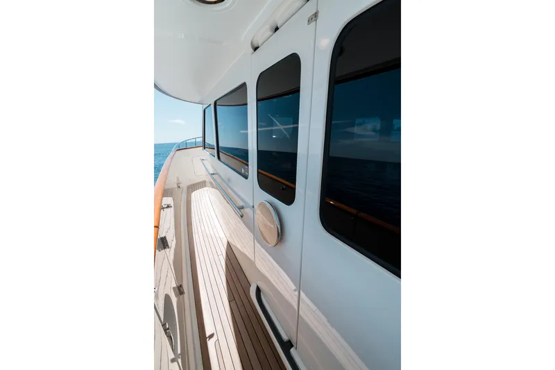 Rat Pack Yacht Photos Pics 2011 Marlow Explorer yacht deck with ocean view and sleek design.