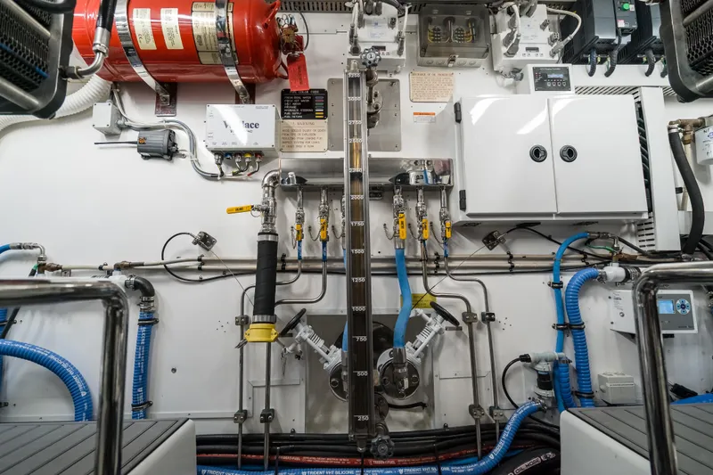 Rat Pack Yacht Photos Pics Engine room of 2011 Marlow Explorer yacht with complex piping and control systems.