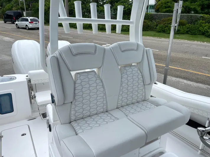  Yacht Photos Pics 2026 Tidewater 282 CC Adventure boat with luxurious seating and rod holders.