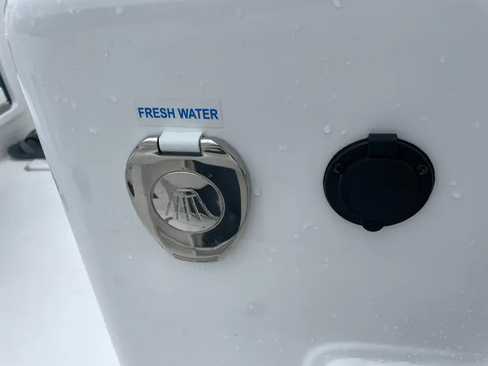  Yacht Photos Pics Fresh water access on 2026 Tidewater 282 CC Adventure boat.