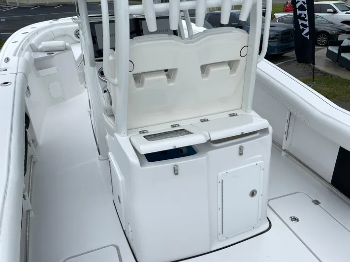  Yacht Photos Pics 2026 Tidewater 282 CC Adventure boat interior with seating and storage compartments.