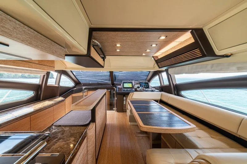 Costa Luna Yacht Photos Pics Luxurious interior of 2014 Azimut 64 yacht with elegant seating and modern helm.