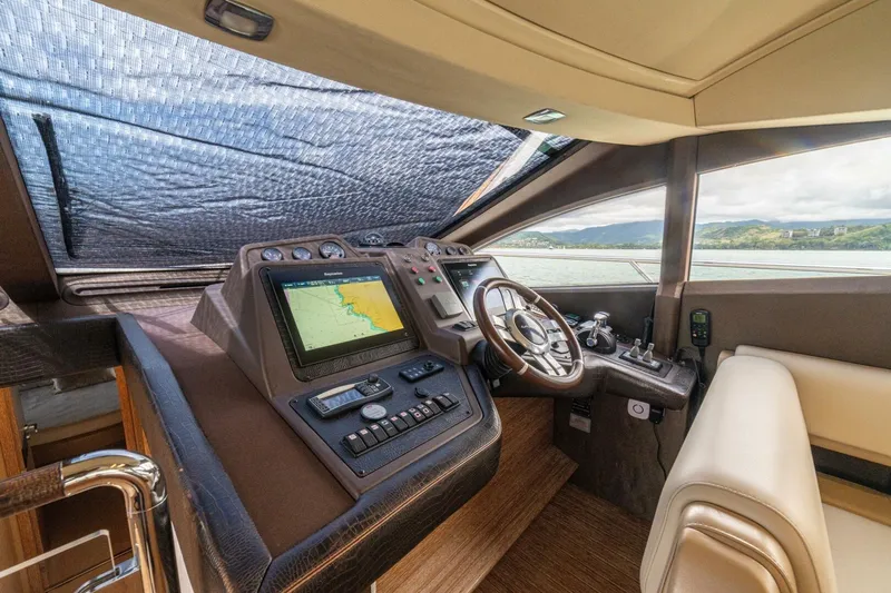 Costa Luna Yacht Photos Pics Luxurious 2014 Azimut 64 yacht helm with navigation system and panoramic view.