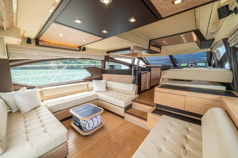 Costa Luna Yacht Photos Pics Luxurious interior of a 2014 Azimut 64 yacht with elegant seating and modern design.