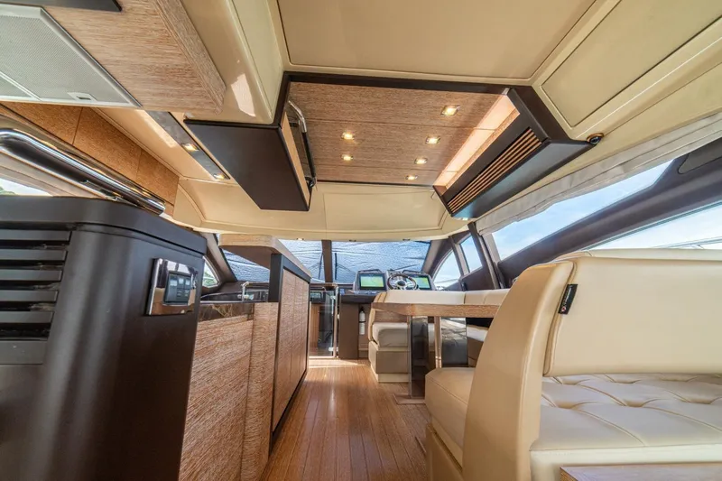 Costa Luna Yacht Photos Pics Luxurious interior of a 2014 Azimut 64 yacht with elegant wood and leather finishes.