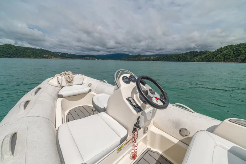 Costa Luna Yacht Photos Pics 2014 Azimut 64 yacht interior with scenic ocean view and lush green hills.