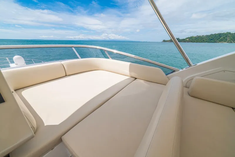 Costa Luna Yacht Photos Pics Luxurious seating on 2014 Azimut 64 yacht with ocean view and clear skies.