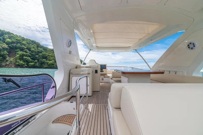 Costa Luna Yacht Photos Pics Luxurious 2014 Azimut 64 yacht interior with ocean view and elegant seating.