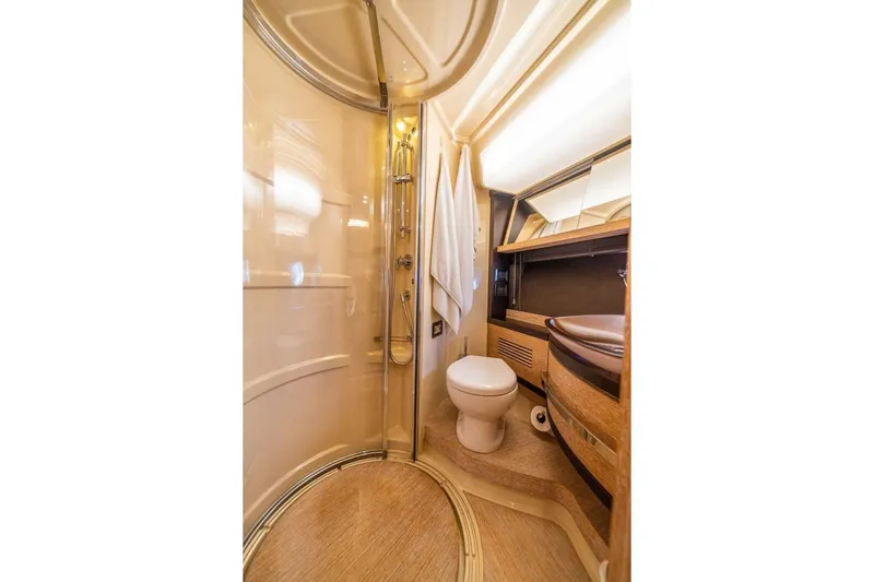 Costa Luna Yacht Photos Pics Luxurious bathroom in 2014 Azimut 64 yacht with shower and modern amenities.